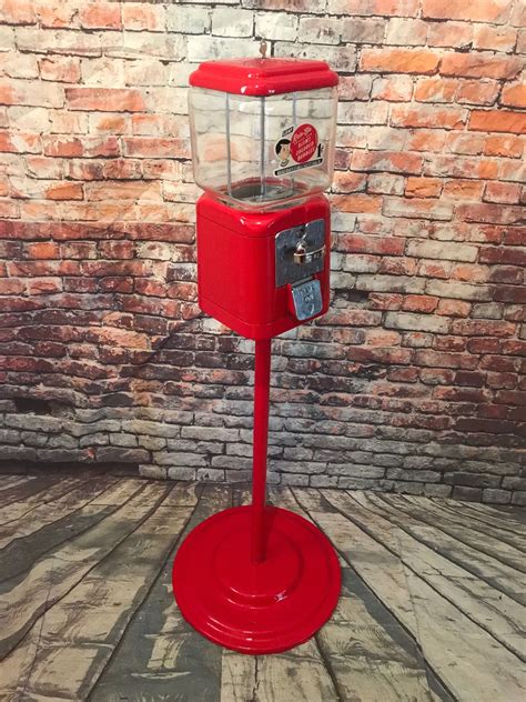 vintage bubble gum machine stand|vintage gumball machine on stand.